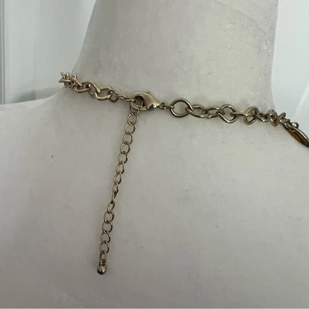 Cream colored faceted bead statement dramatic bib necklace on gold tone chain